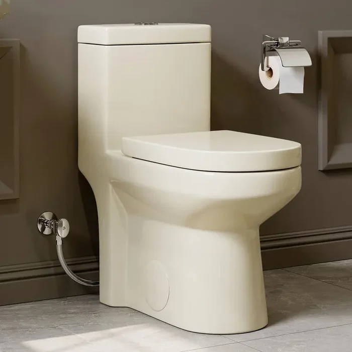 1-Piece 1.1/1.6 GPF Dual Flush Compact Round Toilet in Biscuit Soft Close Seat Included
